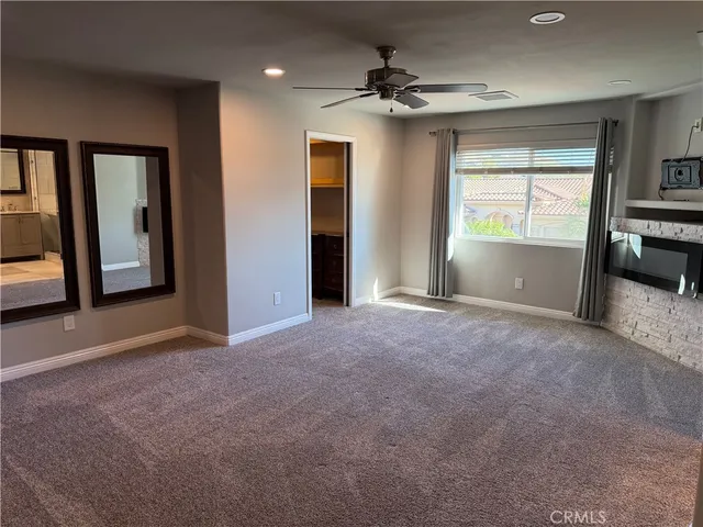a view of livingroom with furniture and windows