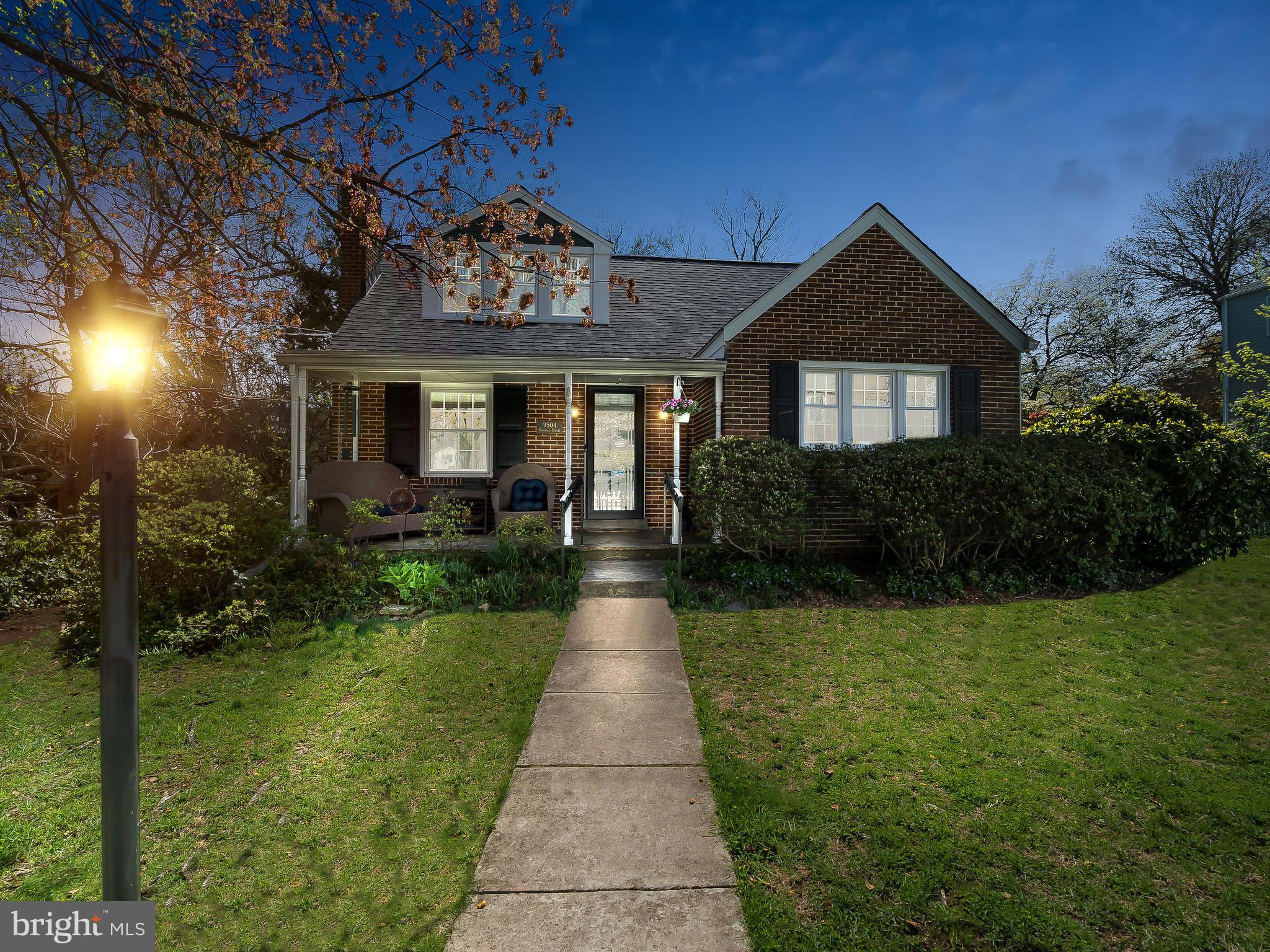 9504 Seminole Street Silver Spring, MD 20901 - Photo 1 of 25 a front view of a house with garden
