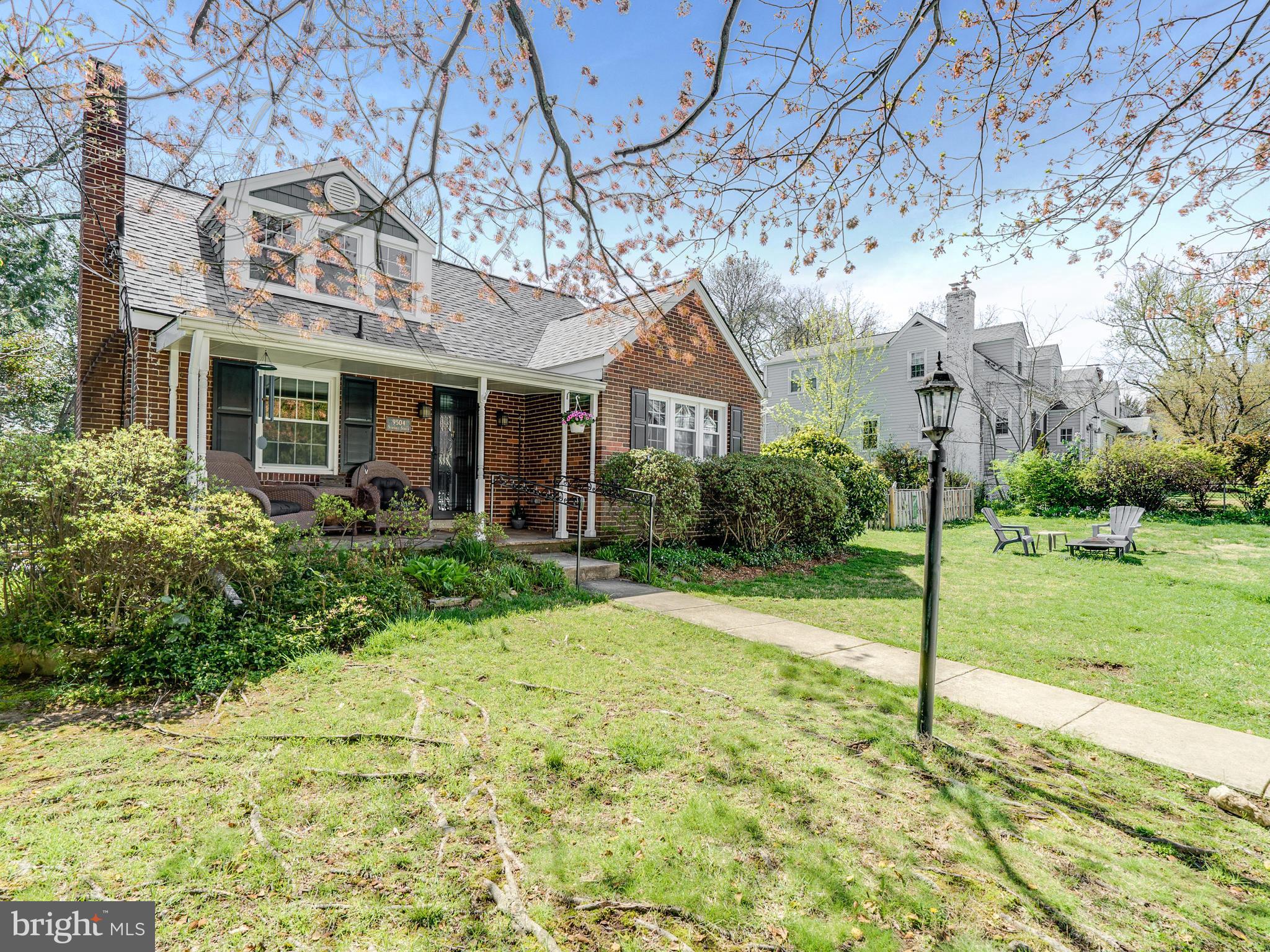 9504 Seminole Street Silver Spring, MD 20901 - Photo 2 of 25 a front view of a house with garden