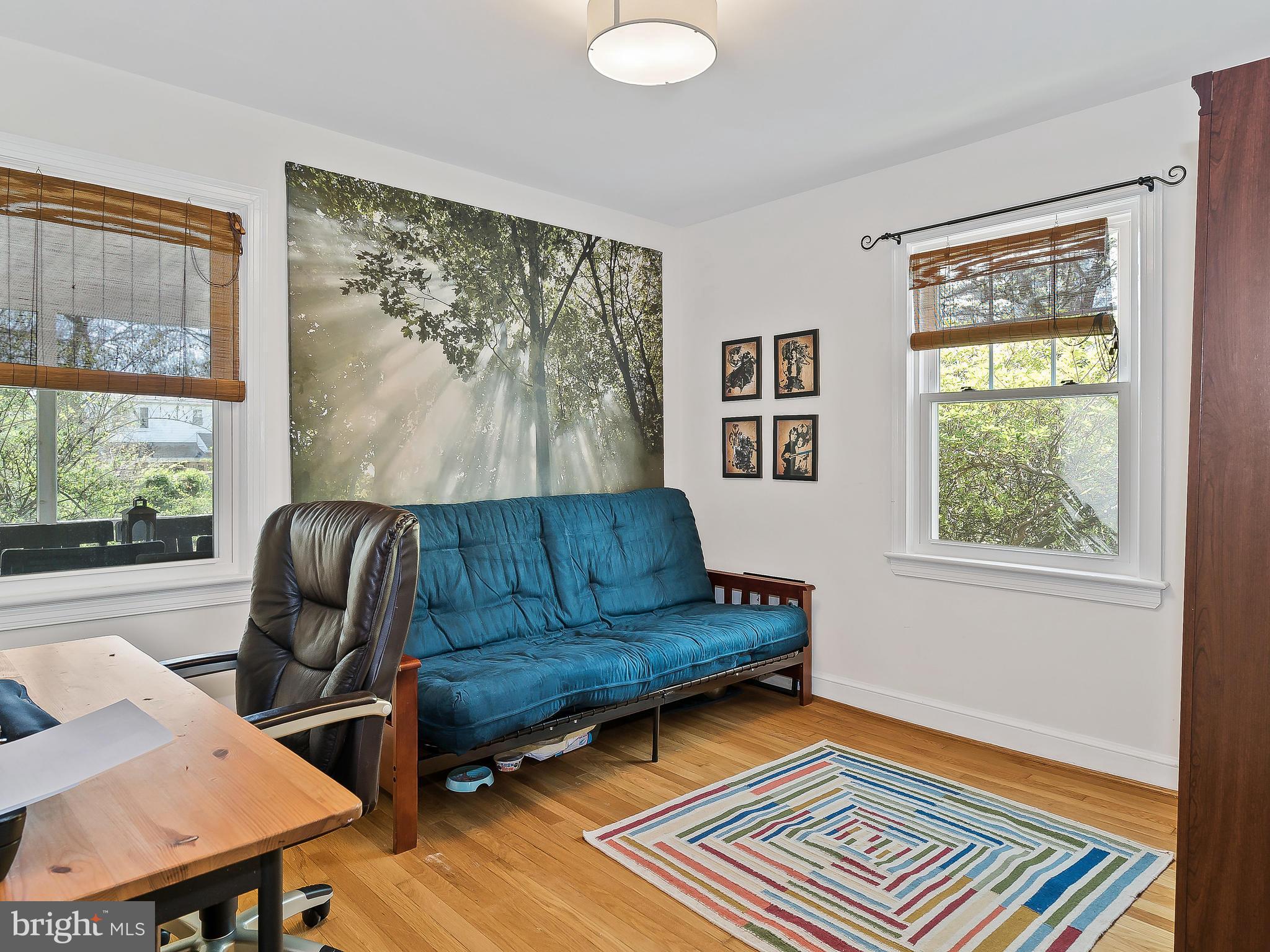 9504 Seminole Street Silver Spring, MD 20901 - Photo 14 of 25 a living room with furniture and a window