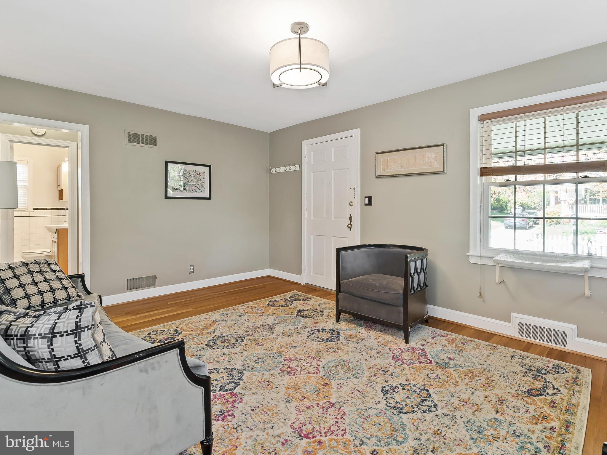 9504 Seminole Street Silver Spring, MD 20901 - Photo 5 of 25 a bedroom with furniture and a window