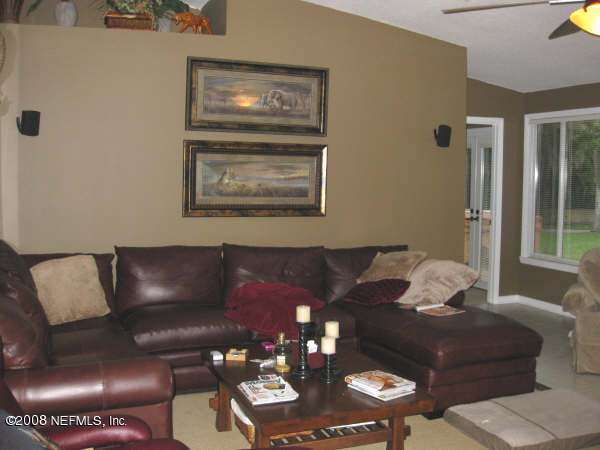 3050 Magnolia Road Orange Park, FL 32065 - Photo 6 of 15 a living room with furniture and wooden floor