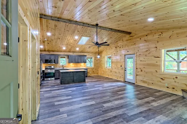 a view of a field with an ocean beach