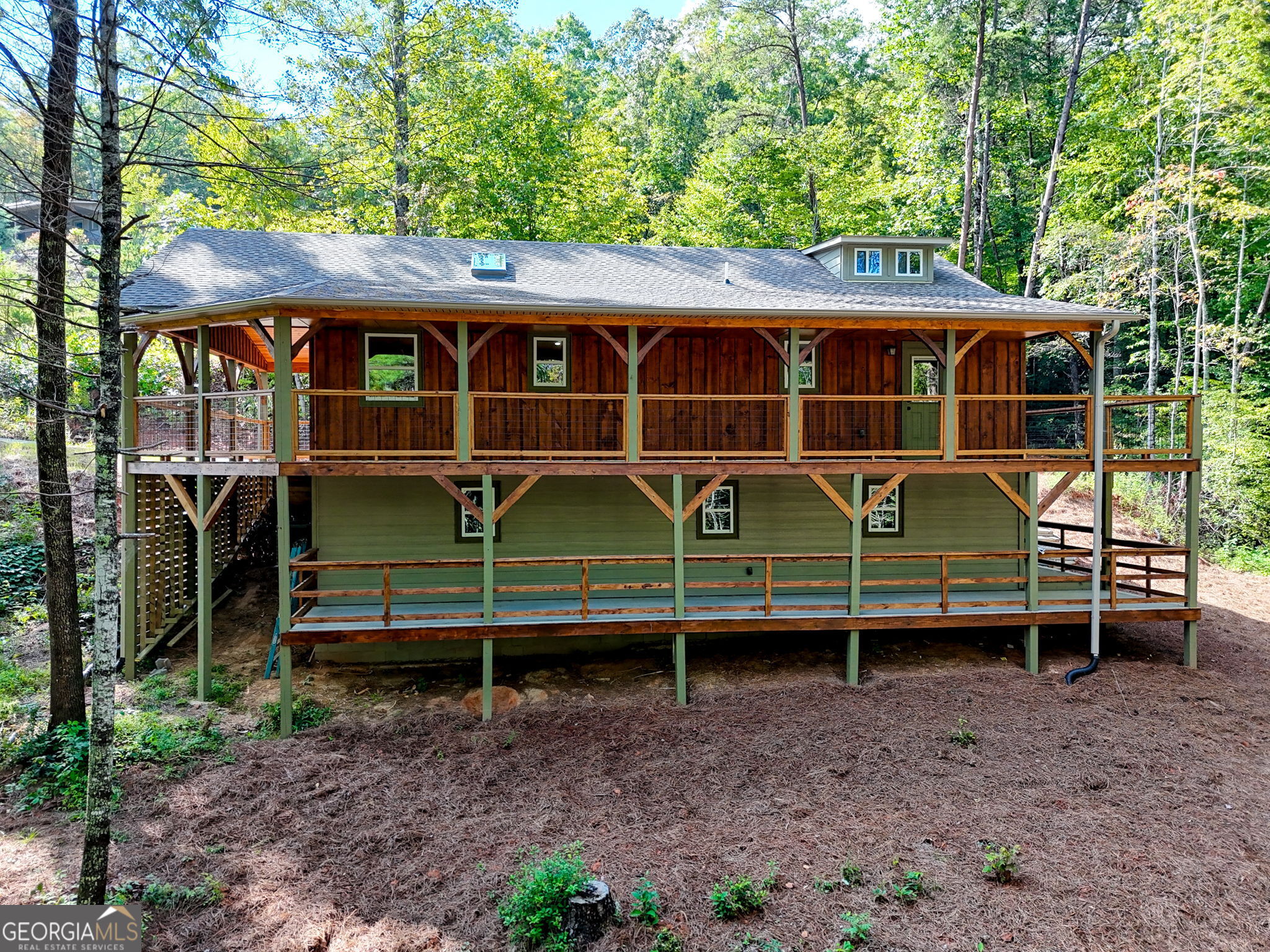 108 Olds Mountain Rabun Gap, GA 30568 - Photo 19 of 73 a view of a house with a yard