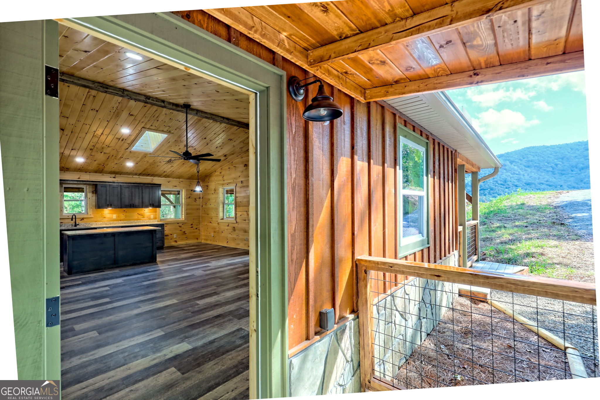 108 Olds Mountain Rabun Gap, GA 30568 - Photo 22 of 73 a view of a glass door with a balcony