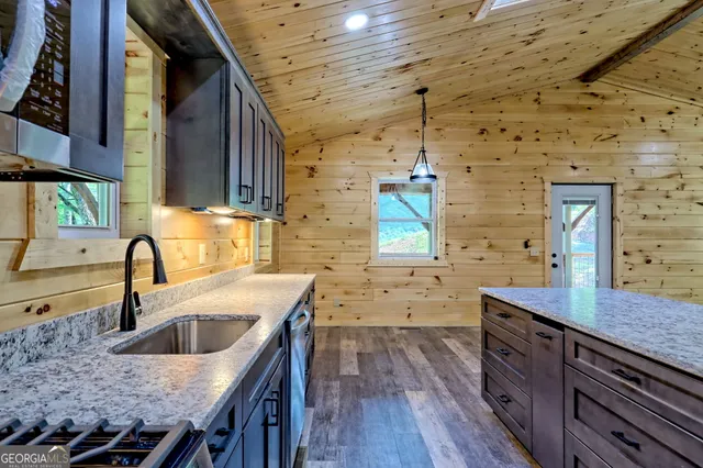 a bathroom with a sink and a shower