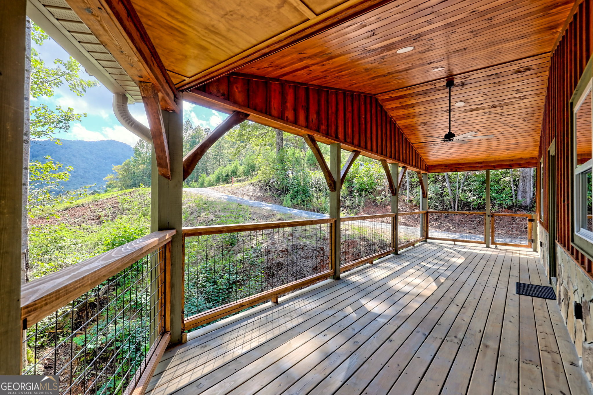 108 Olds Mountain Rabun Gap, GA 30568 - Photo 27 of 73 a view of porch with wooden floor in outdoor space