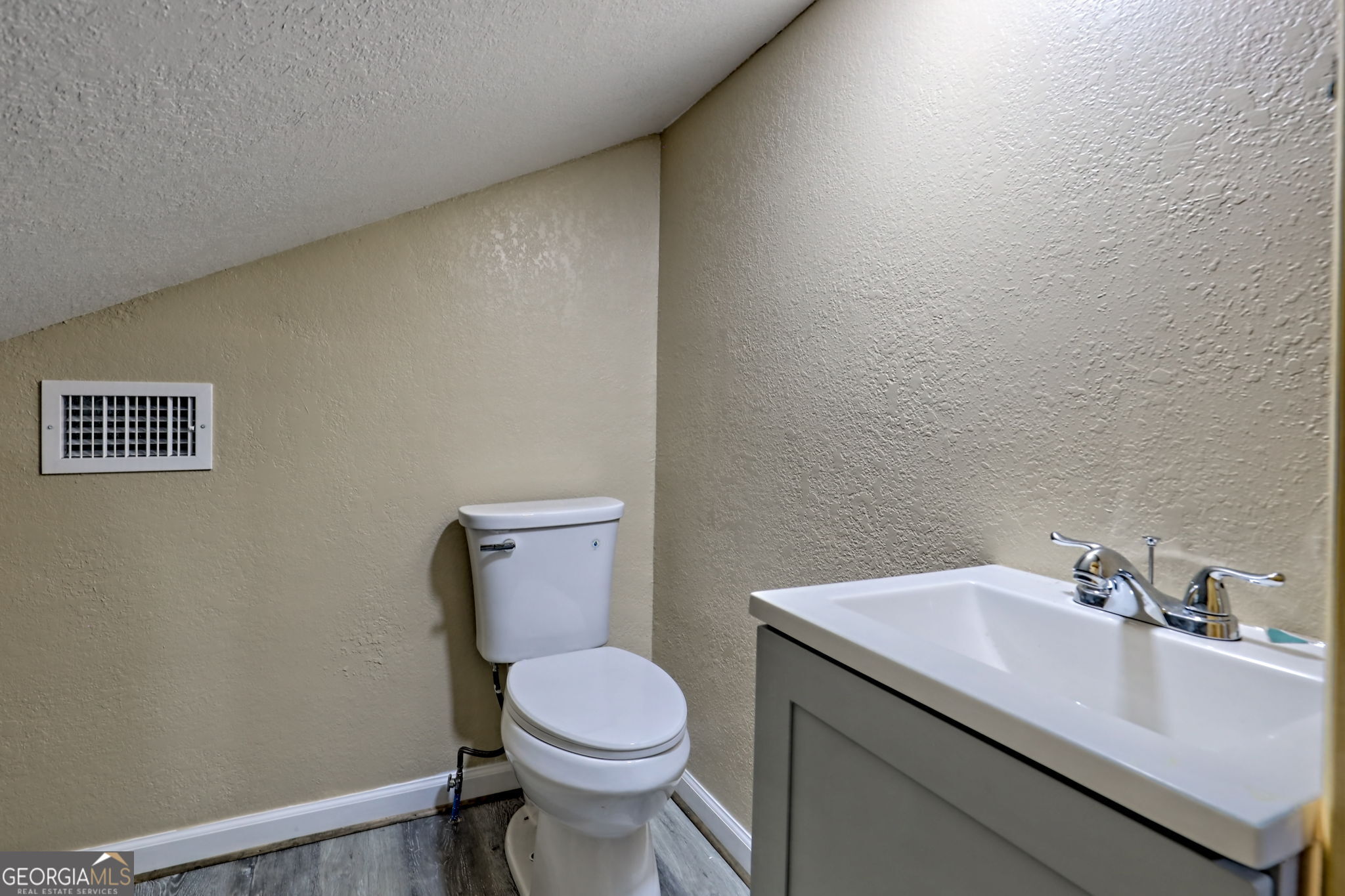 108 Olds Mountain Rabun Gap, GA 30568 - Photo 41 of 73 a bathroom with a sink mirror and toilet