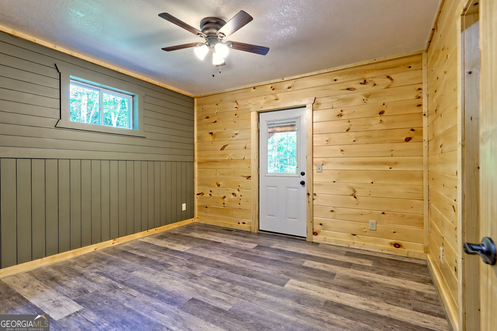 108 Olds Mountain Rabun Gap, GA 30568 - Photo 45 of 73 wooden floor in an empty room with a window