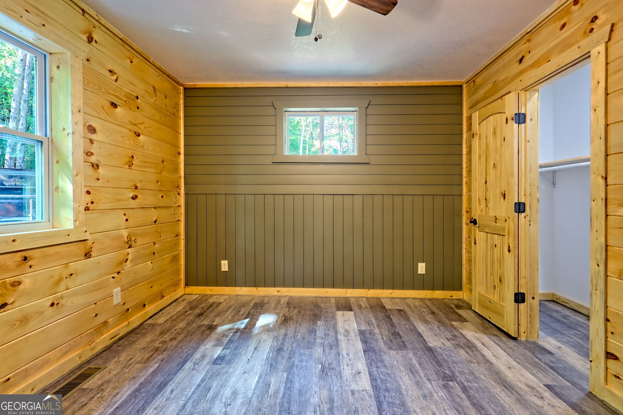 108 Olds Mountain Rabun Gap, GA 30568 - Photo 57 of 73 a view of a bathroom with wooden floor and a window