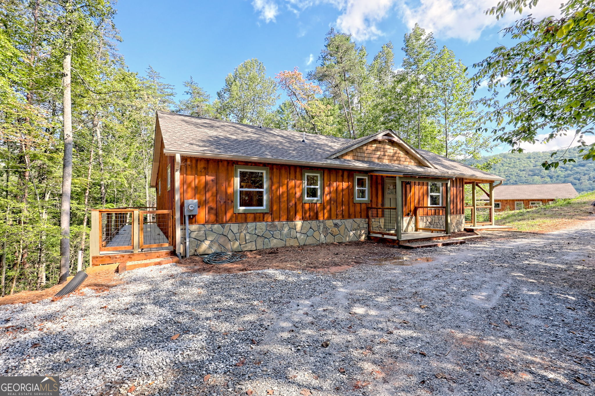 108 Olds Mountain Rabun Gap, GA 30568 - Photo 73 of 73 a front view of a house with garden