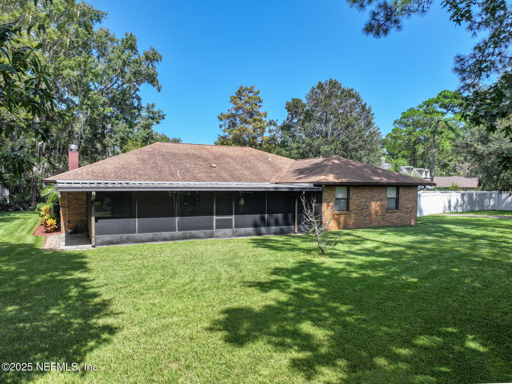 12876 Squirrel Tree Court Jacksonville, FL 32246 - Photo 2 of 33 a front view of a house with garden