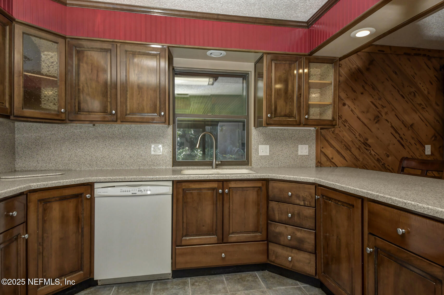 12876 Squirrel Tree Court Jacksonville, FL 32246 - Photo 25 of 33 a kitchen with a sink and cabinets