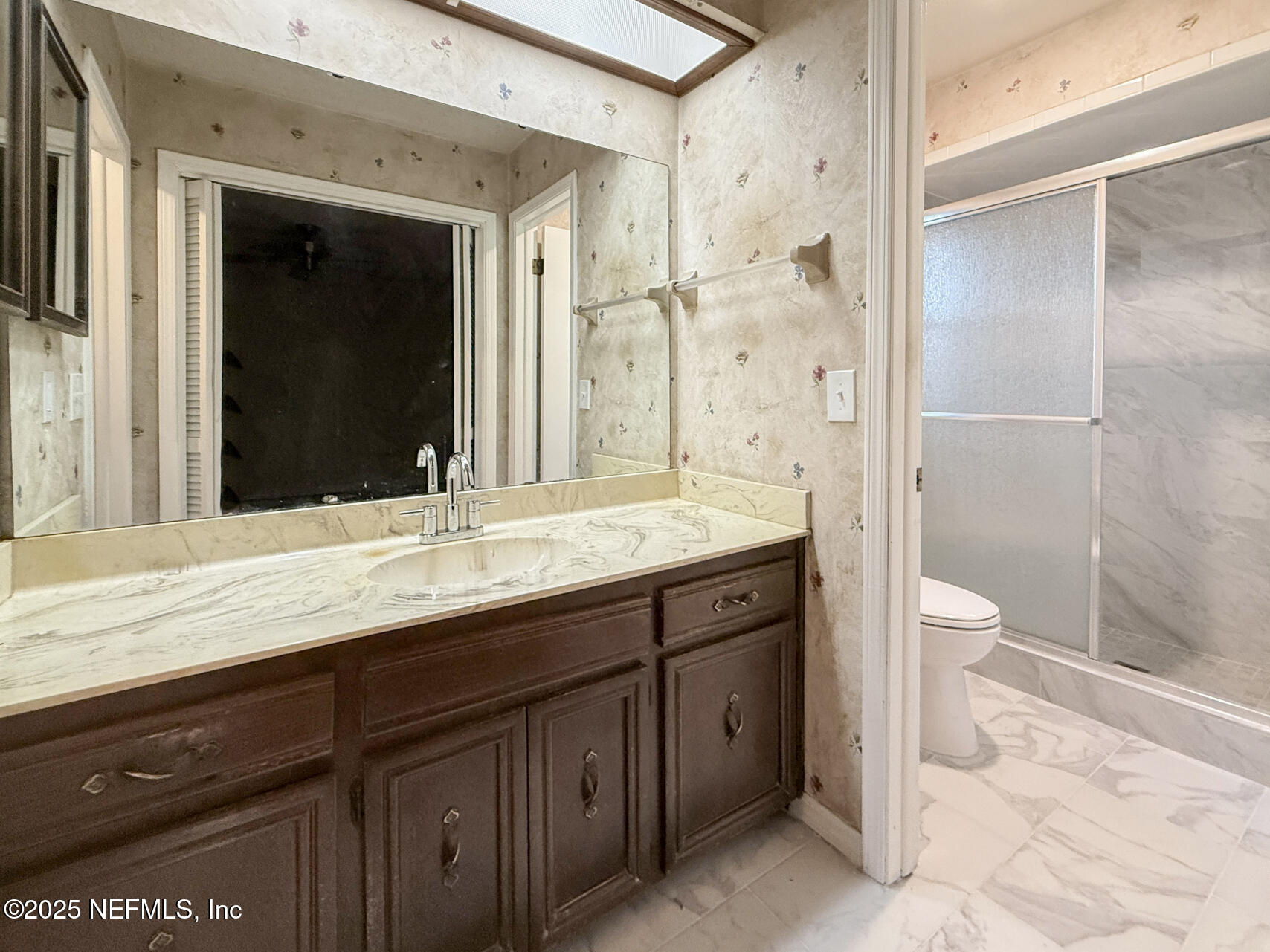 12876 Squirrel Tree Court Jacksonville, FL 32246 - Photo 28 of 33 a bathroom with a granite countertop sink toilet and shower