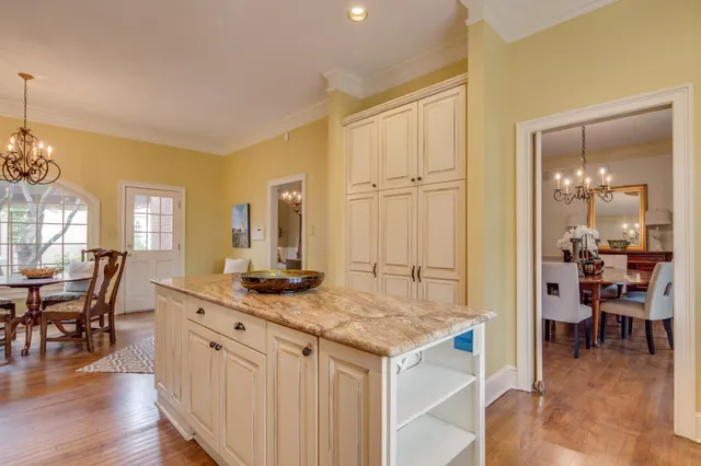 a view of kitchen island dining table and chairs