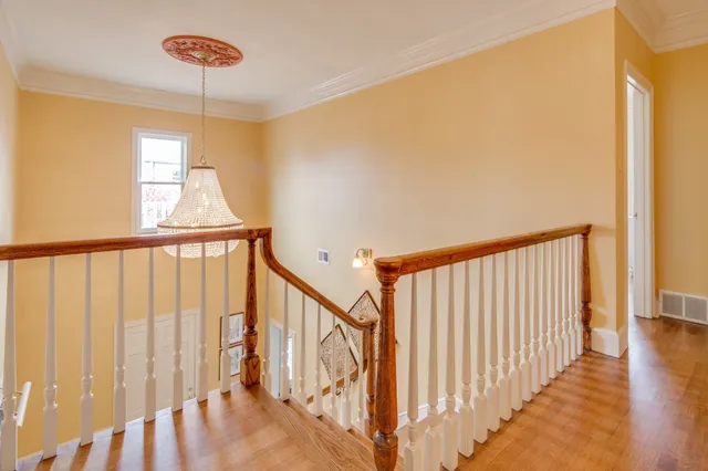 a view of entryway with wooden floor
