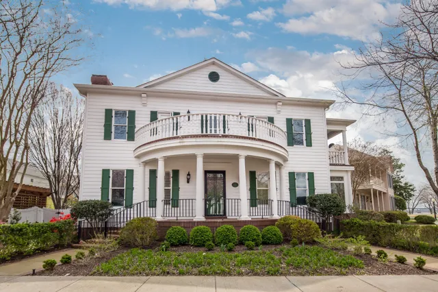 a front view of a house with a porch