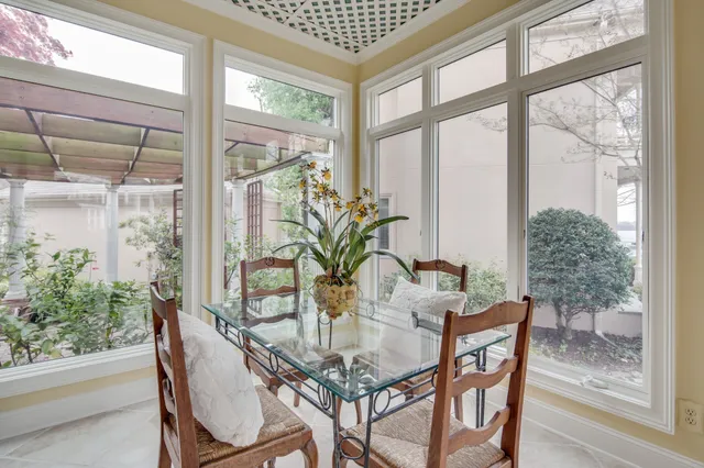 an aerial view of a house with a swimming pool