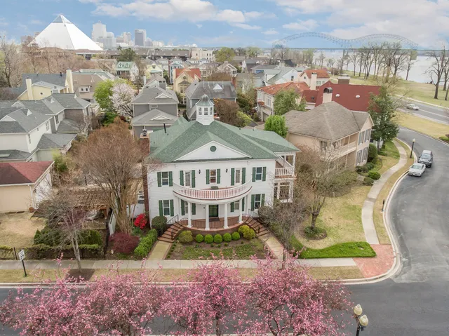 a view of entryway livingroom and hall with wooden floor