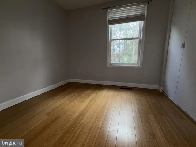 a view of a kitchen from the hallway
