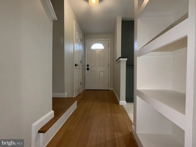a view of a bathroom from the hallway