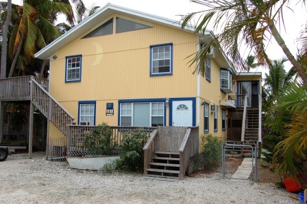 82 North Conch Avenue Marathon, FL 33050 - Photo 2 of 22 a view of a house with a yard and furniture