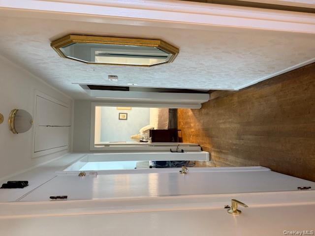 433 Browns Road Nesconset, NY 11767 - Photo 11 of 47 a view of a bathroom from a hallway