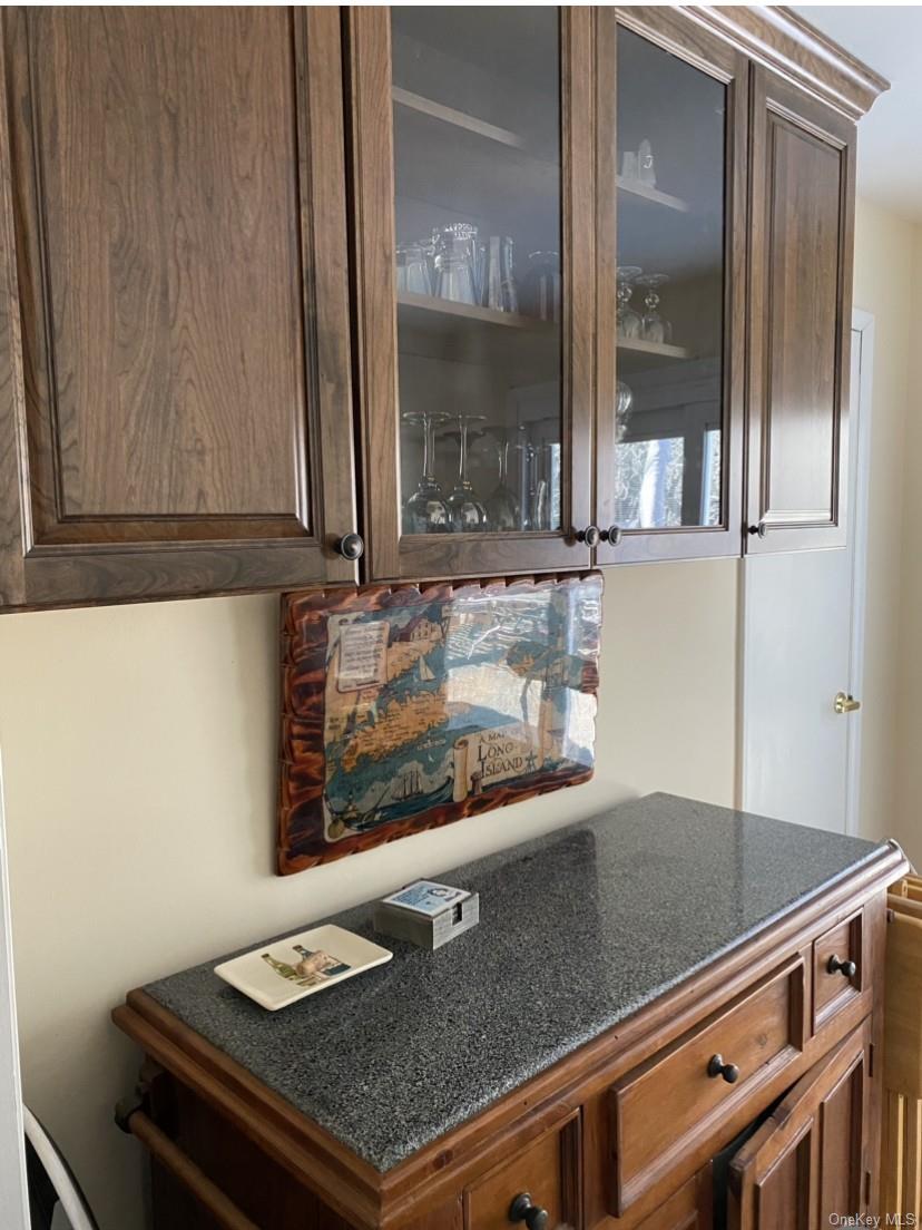 433 Browns Road Nesconset, NY 11767 - Photo 16 of 47 a kitchen with a sink and a window