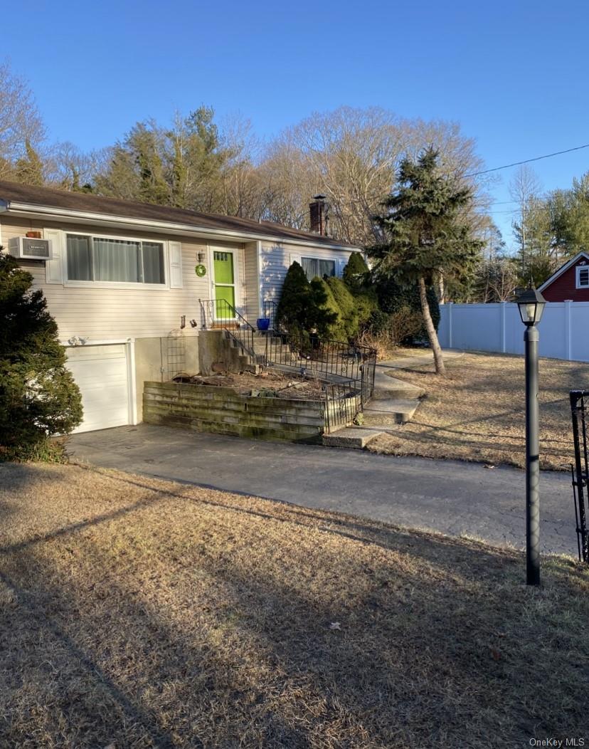 433 Browns Road Nesconset, NY 11767 - Photo 3 of 47 a view of a house with street