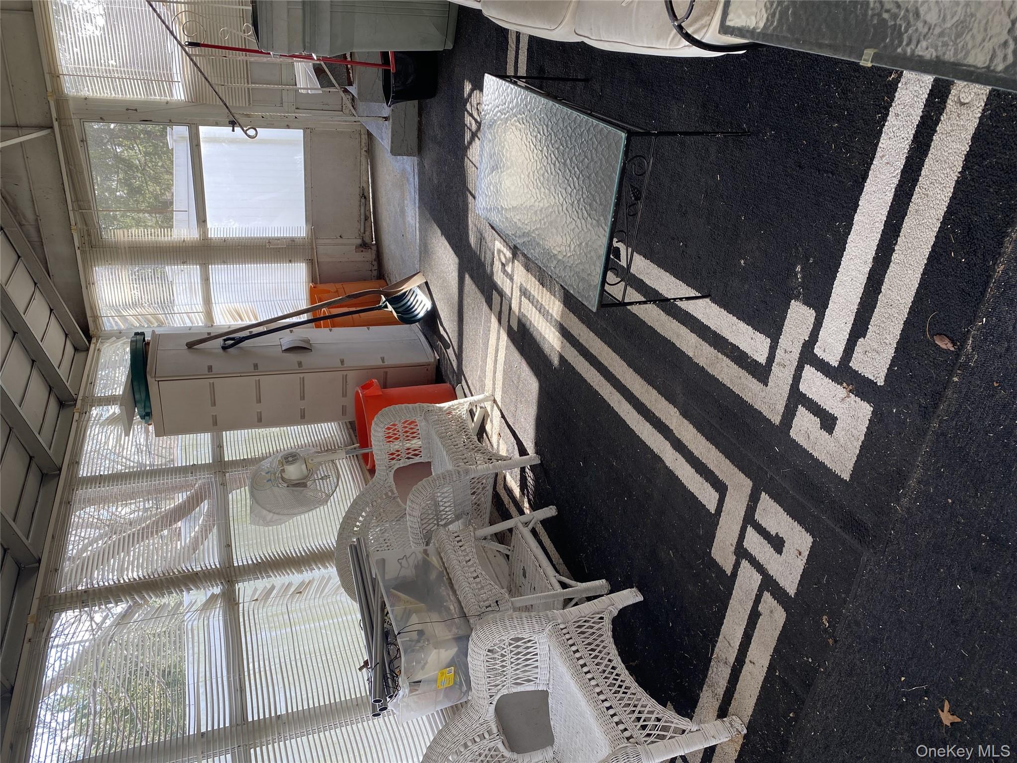 433 Browns Road Nesconset, NY 11767 - Photo 34 of 47 a view of a room with gym equipment