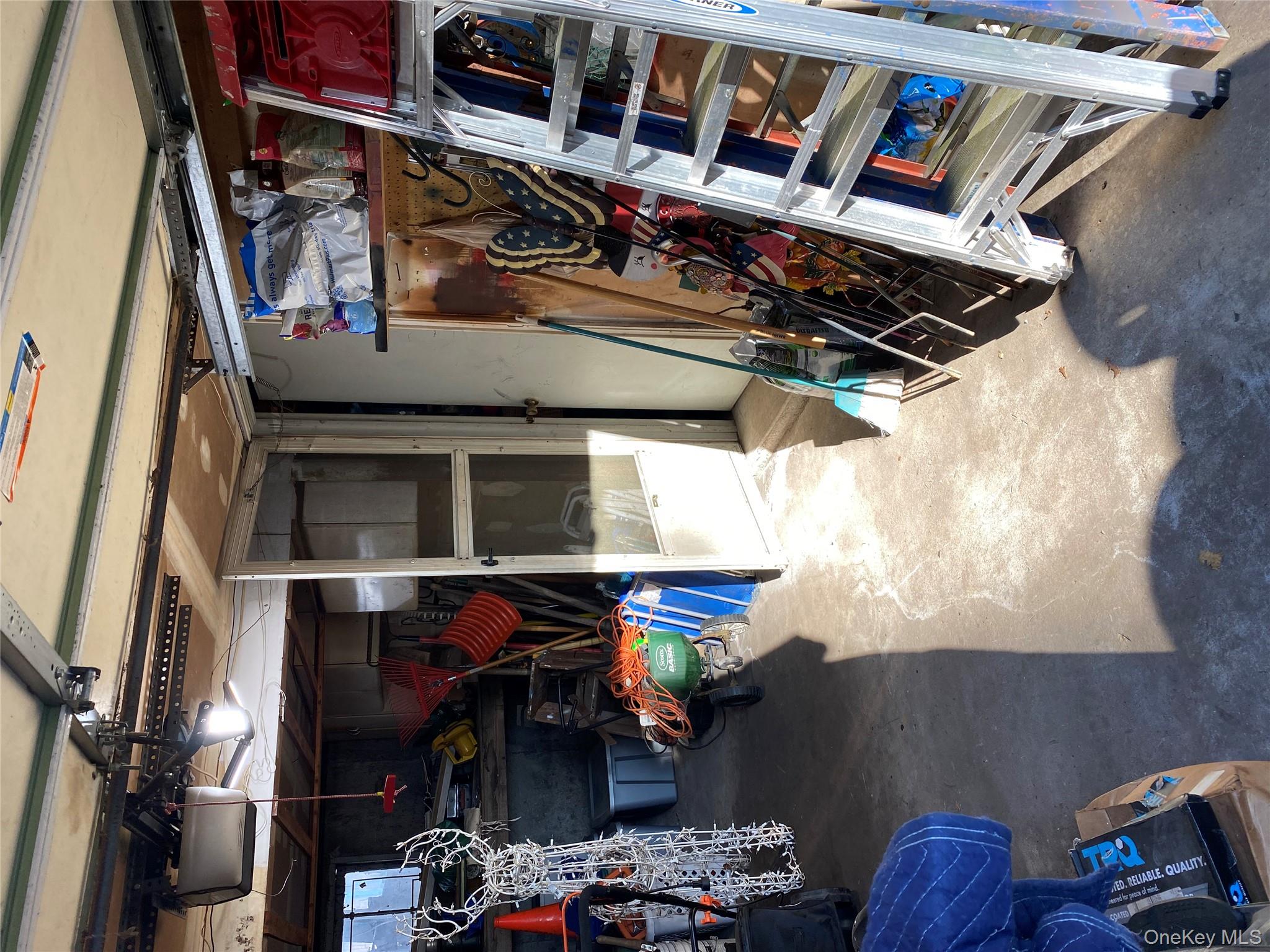 433 Browns Road Nesconset, NY 11767 - Photo 40 of 47 a view of a storage room with furniture