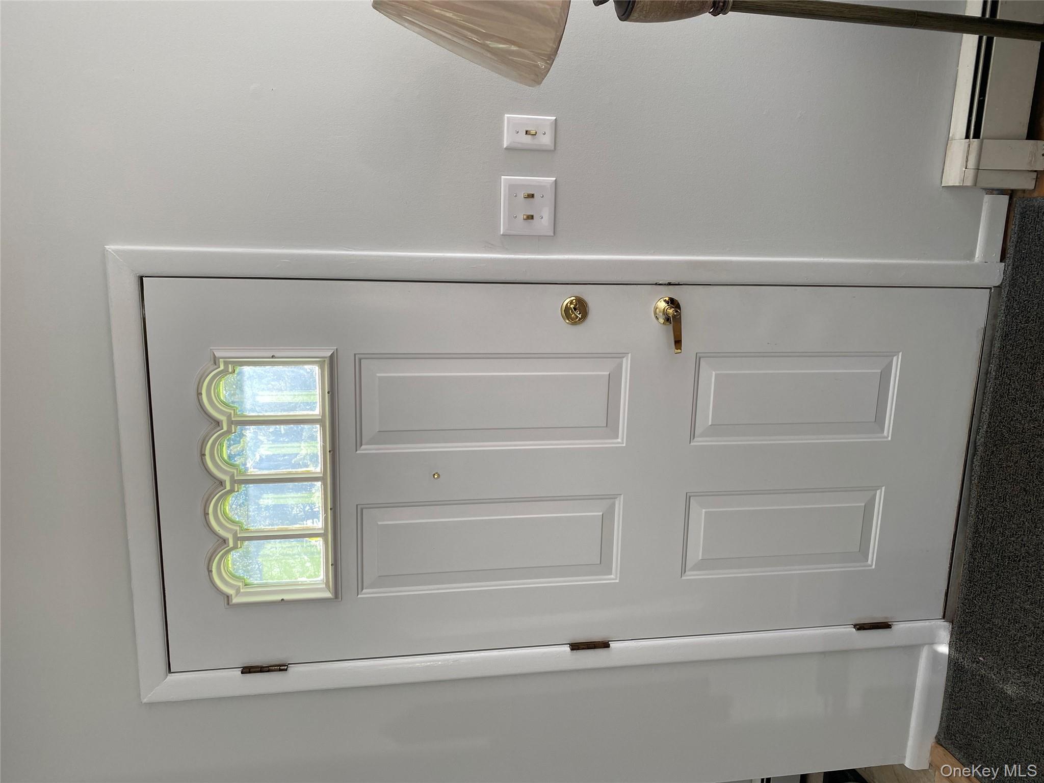 433 Browns Road Nesconset, NY 11767 - Photo 4 of 47 a view of an entryway with wooden floor