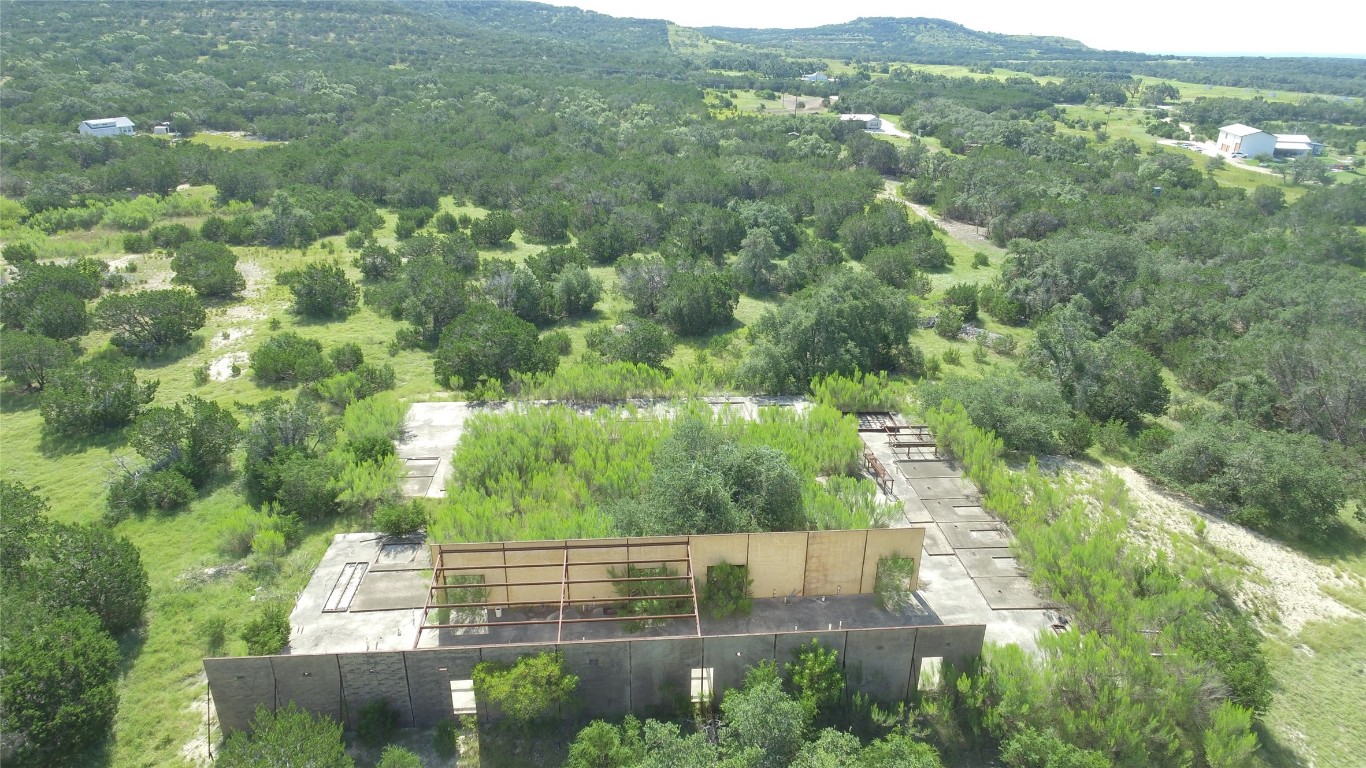932 High Country Road Blanco, TX 78606 - Photo 13 of 23 a view of a forest with a street