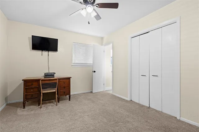 a view of a livingroom with furniture