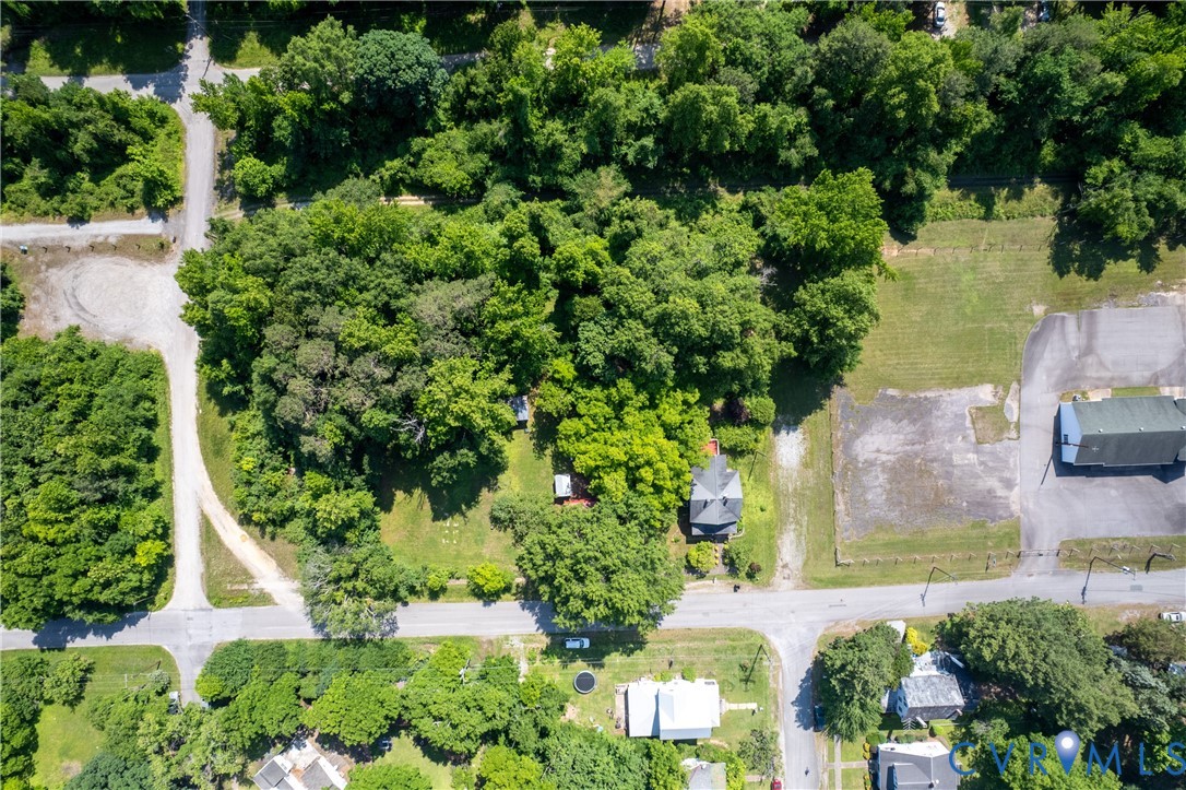 0 Main Street Victoria, VA 23974 - Photo 1 of 5 an aerial view of a house with a yard and lake view