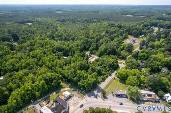an aerial view of a city with lots of residential buildings