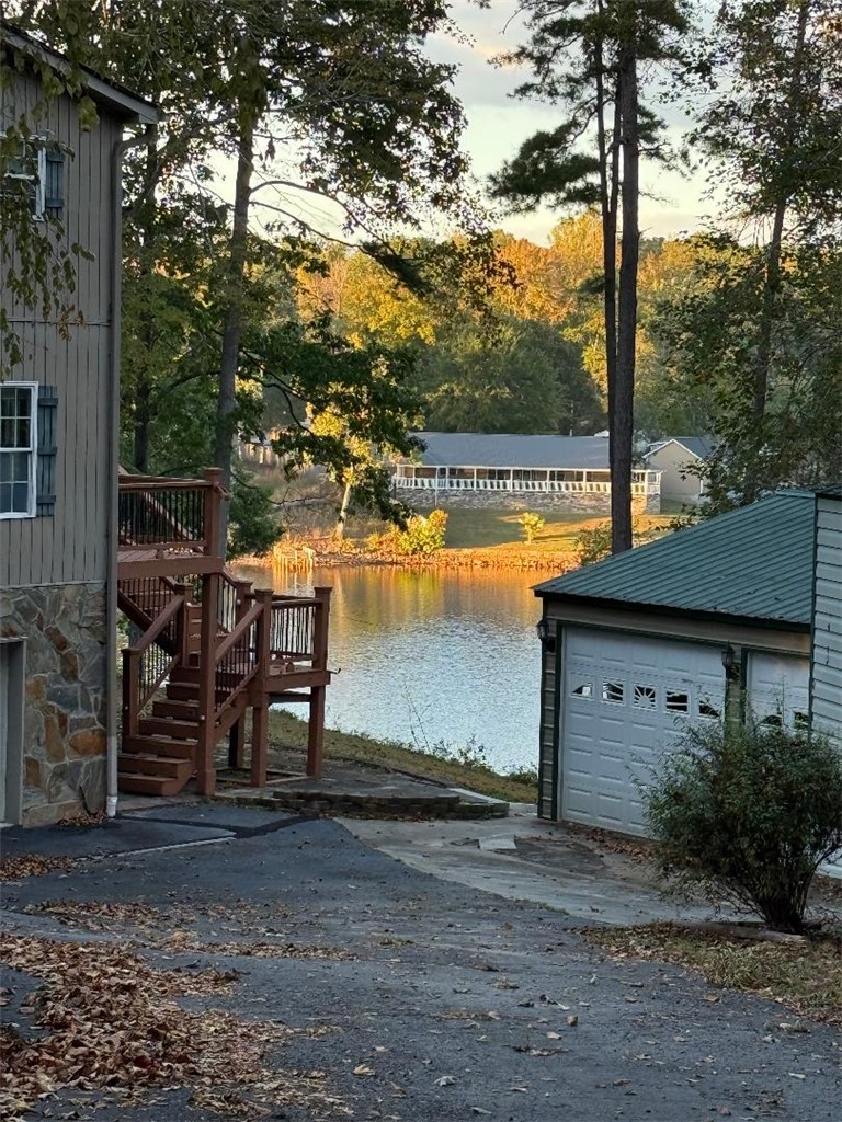 This tranquil waterfront property offers picturesque views and direct access to the serene lake.