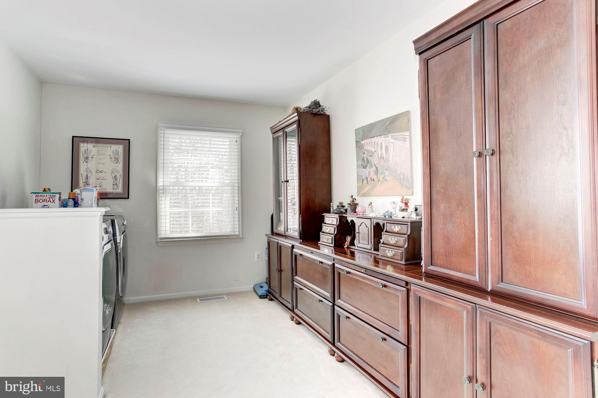 11805 Antietam Road Woodbridge, VA 22192 - Photo 36 of 54 Private upper level laundry room