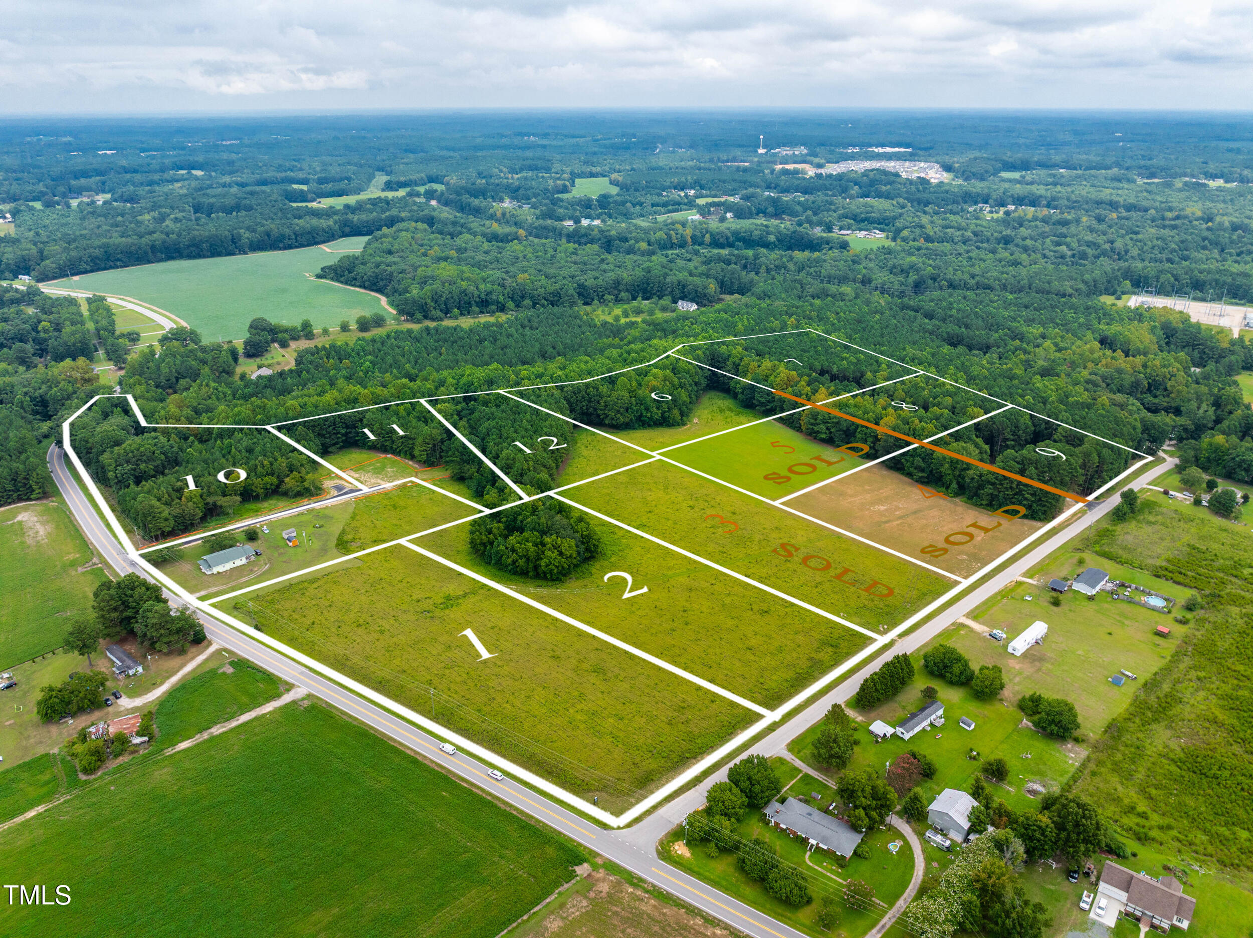 10320 Basmati Trail Zebulon, NC 27597 - Photo 7 of 15 a view of a tennis court