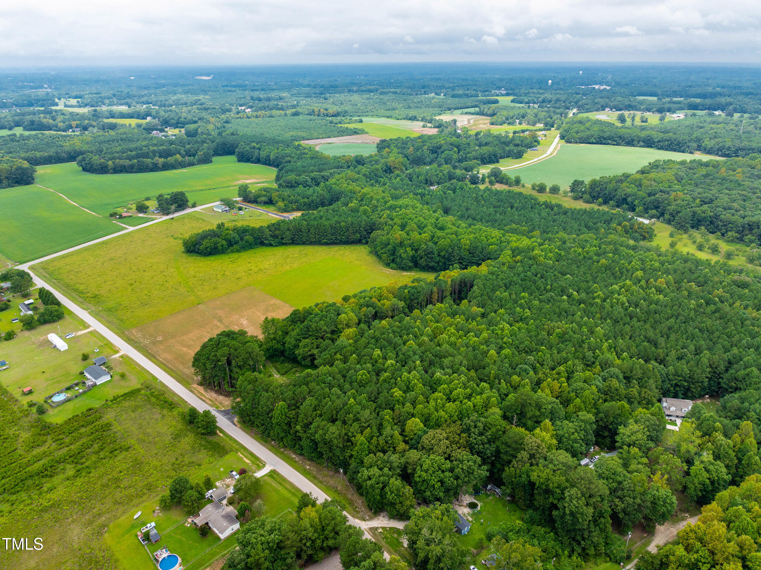 10320 Basmati Trail Zebulon, NC 27597 - Photo 10 of 15 an aerial view of a residential houses with outdoor space and street view
