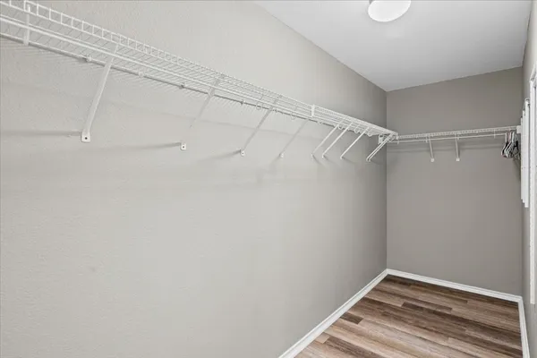 a view of a room with racks on the wall
