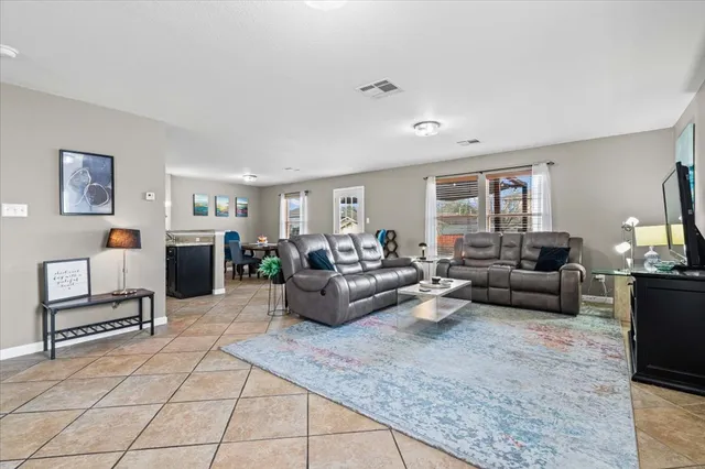 a living room with furniture and a couch