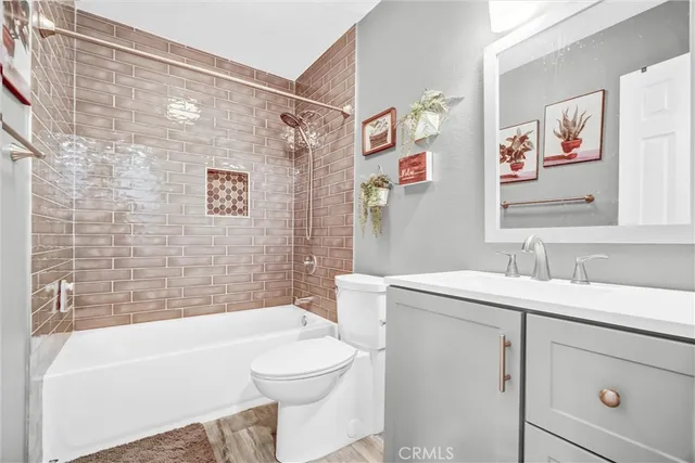 a bathroom with a sink a toilet and a bathtub