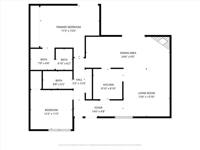 an aerial view of residential houses with city view