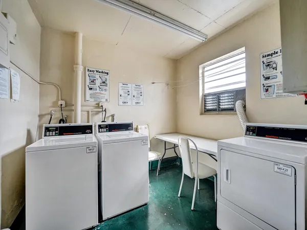 a room with dryer and washer