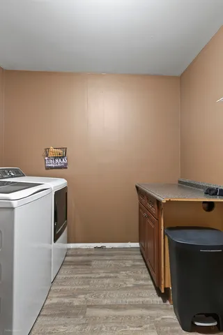 a utility room with washer and dryer
