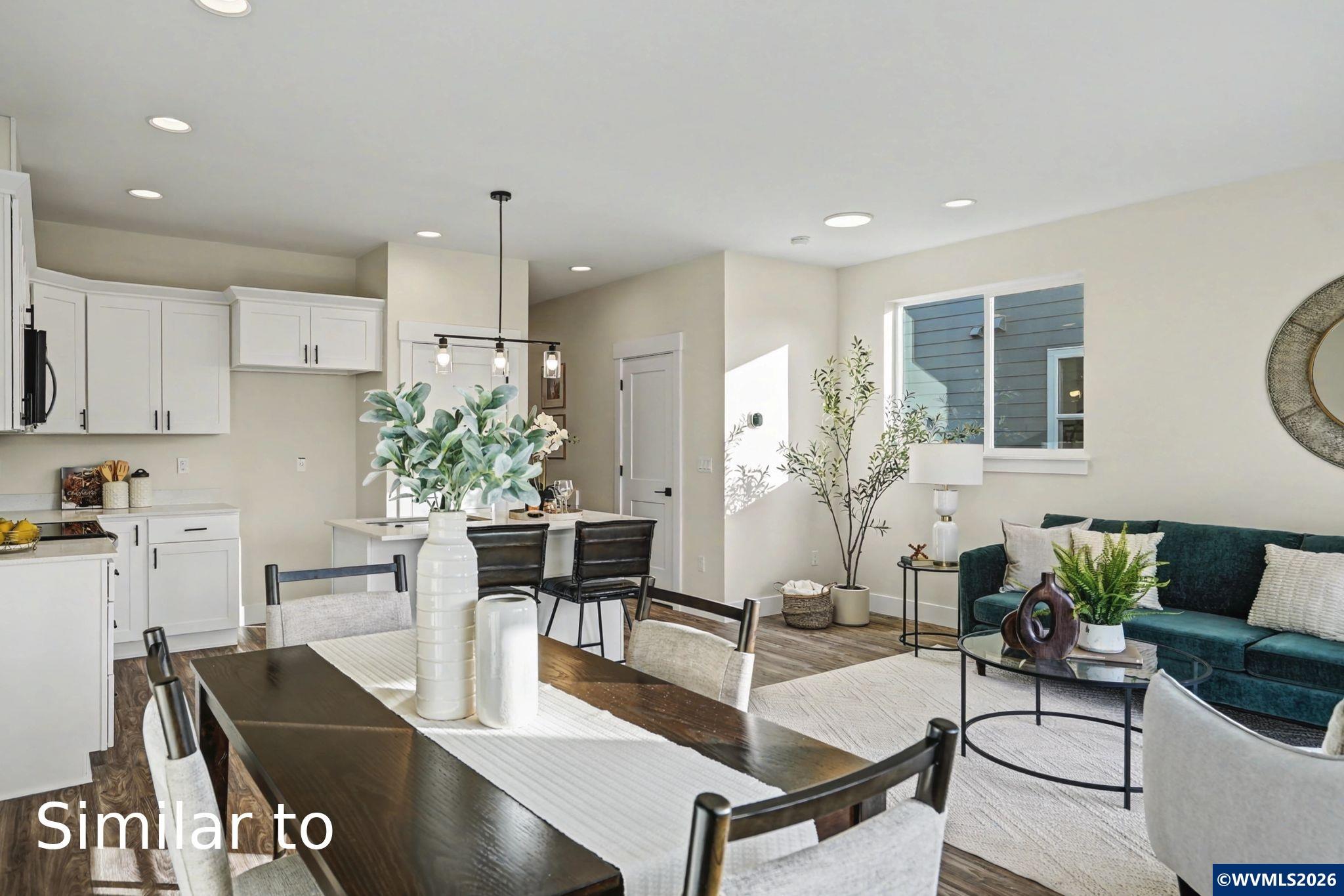 2550 Promise Way Lebanon, OR 97355 - Photo 15 of 35 a living room with furniture and a chandelier