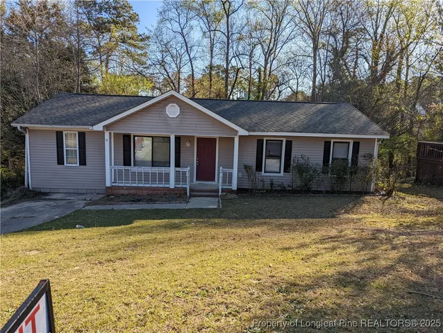 a house view with a garden space
