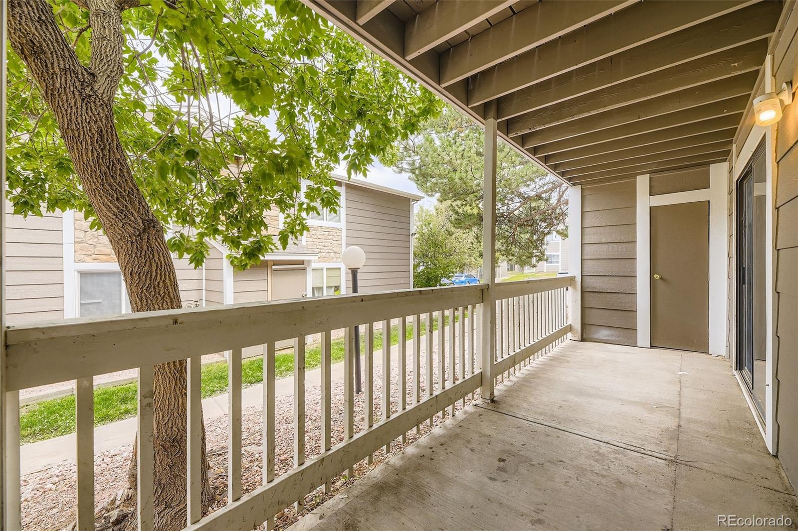 18003 East Ohio Avenue, Unit 102 Aurora, CO 80017 - Photo 11 of 11 a view of a porch