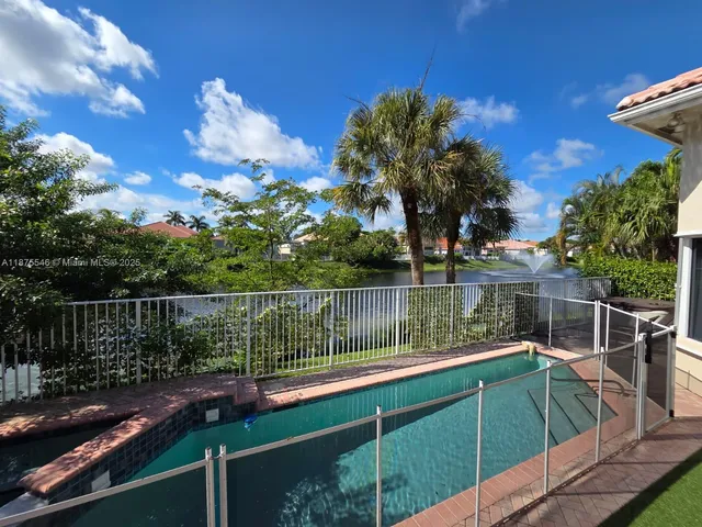 a view of a lake from a balcony